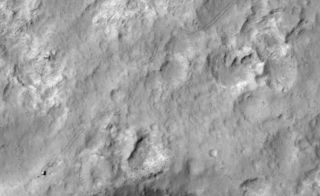 Mars Rover-sporen gezien vanuit de ruimte