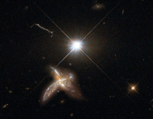 Hintergrundbild: Sternentstehung in der nahe gelegenen Galaxie