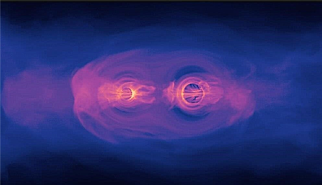 Esta simulação mostra como os buracos negros monstruosos brilham antes de colidirem