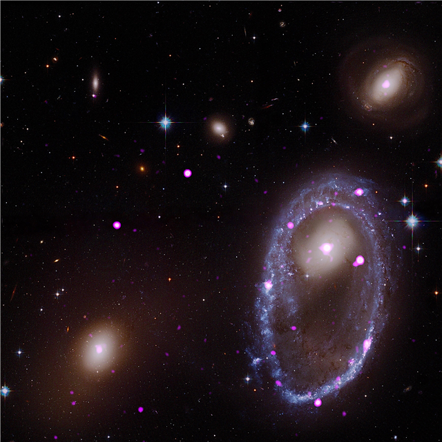 Galaktika caurdur kaimiņu līdz nārsta milzu gredzenam ar melniem caurumiem
