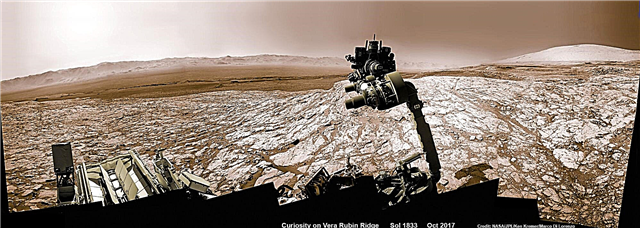 A curiosidade apontada pelo céu captura a vista de tirar o fôlego da orla do Monte Sharp e da cratera, sobe Vera Rubin em busca de minerais marcianos hidratados