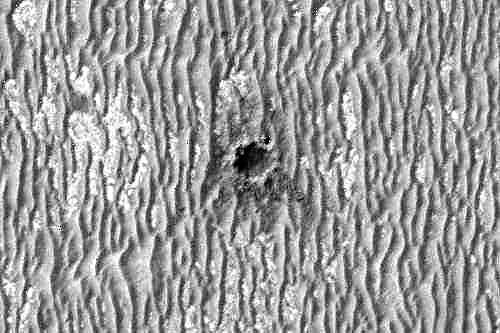 MRO ziet kansen op de rand van de Concepcion-krater (en meer!)