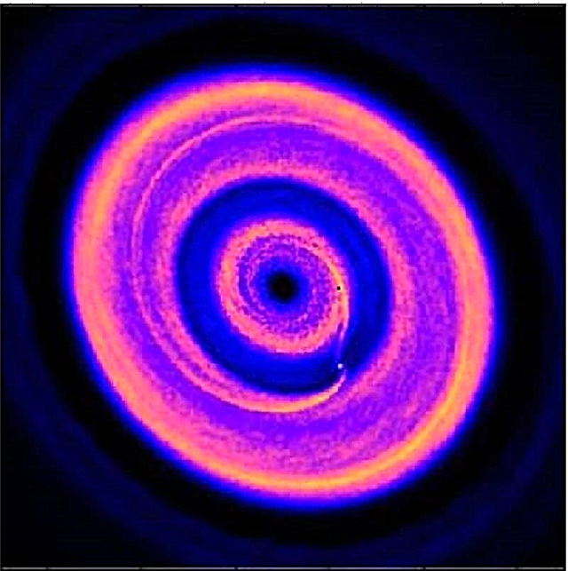 Vue simulée d'un système planétaire nouvellement formé avec des anneaux et des lacunes
