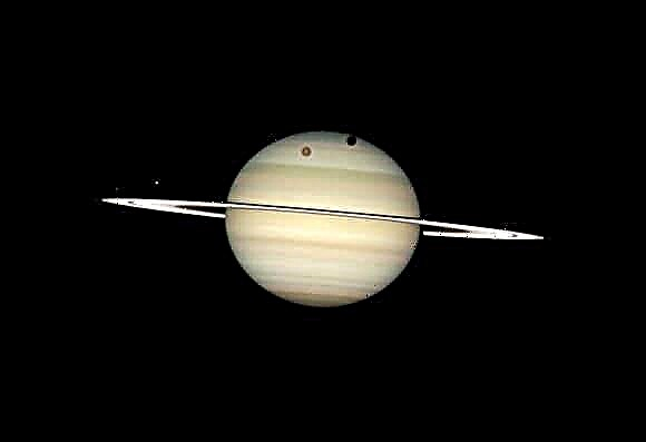 Hubble Snaps Rare Moon Parade Across Saturn